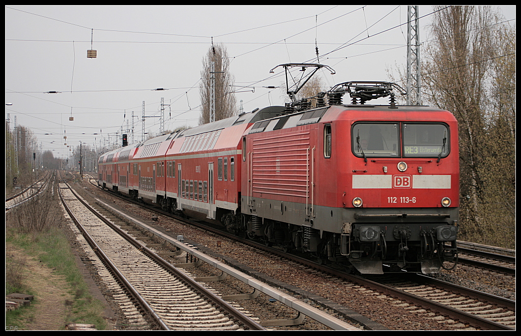 DB Regio 112 113-6 mit dem RE3 Elsterwerda in Berlin Karow am 13.04.2010