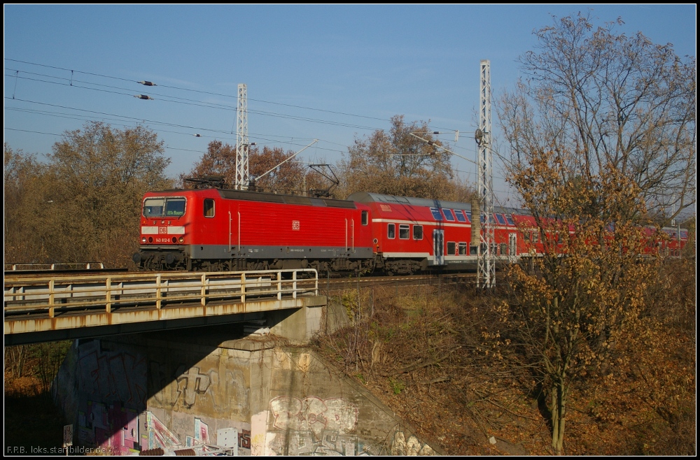 DB Regio 143 812 mit dem RE4 nach Nauen am 14.11.2012 Höhe Berlin Wuhlheide