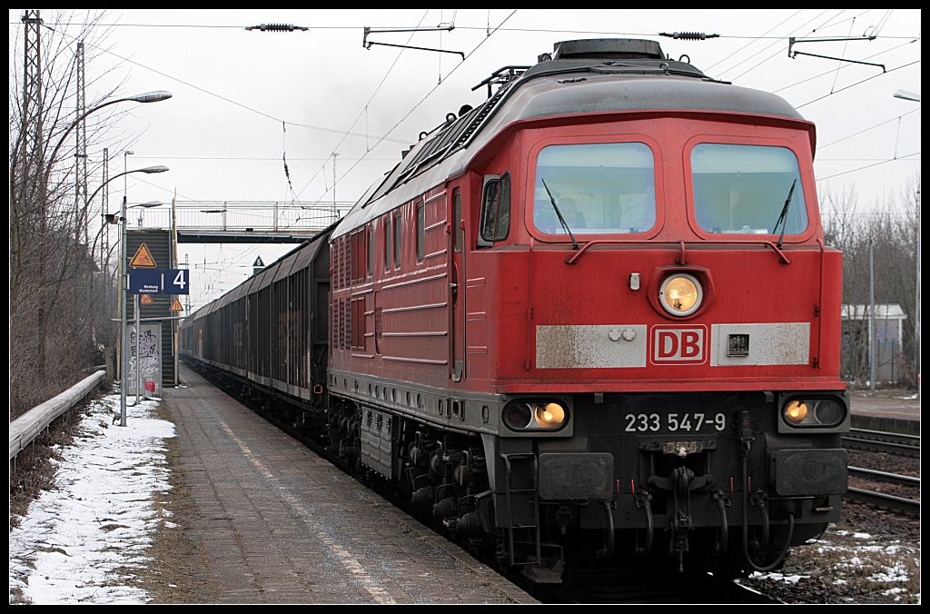 DB Schenker 233 547-9 mit einem Zug Seitenwandwagen (ex 232 547-0, gesehen Wustermark-Priort 16.03.2010)