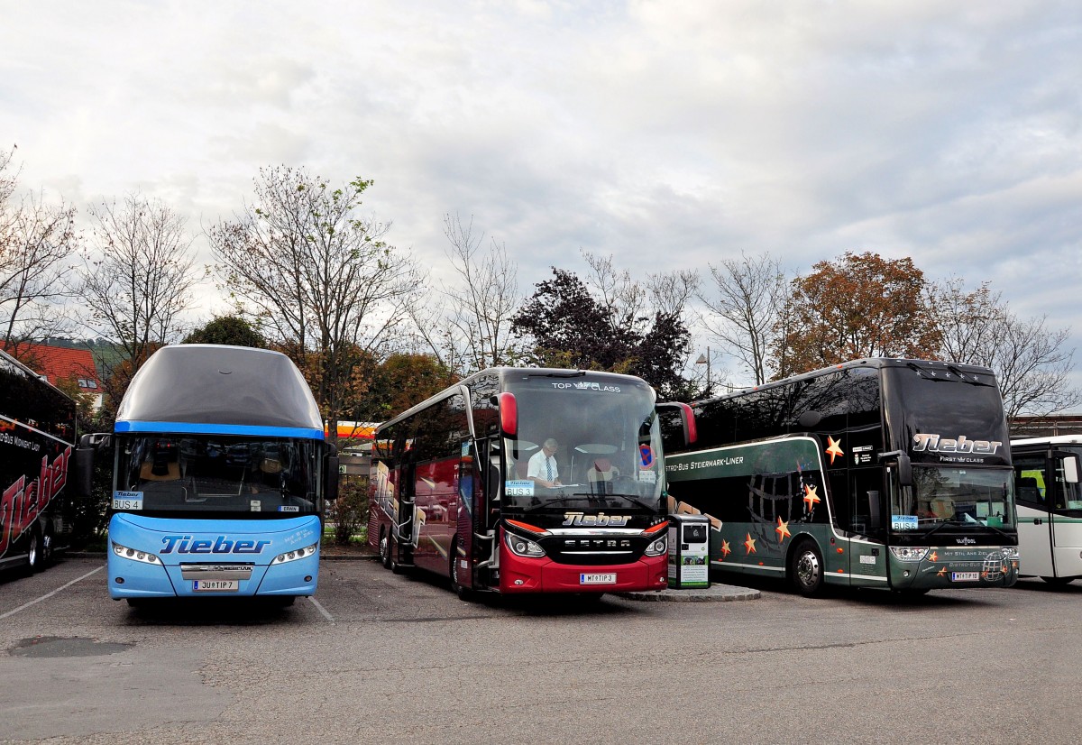 2 mal von TIEBER Reisen aus sterreich am 20.9.2014 in Krems.Links der Neoplan Cityliner,mittig ein Setra 516 HDH und rechts ein Van Hool T9.