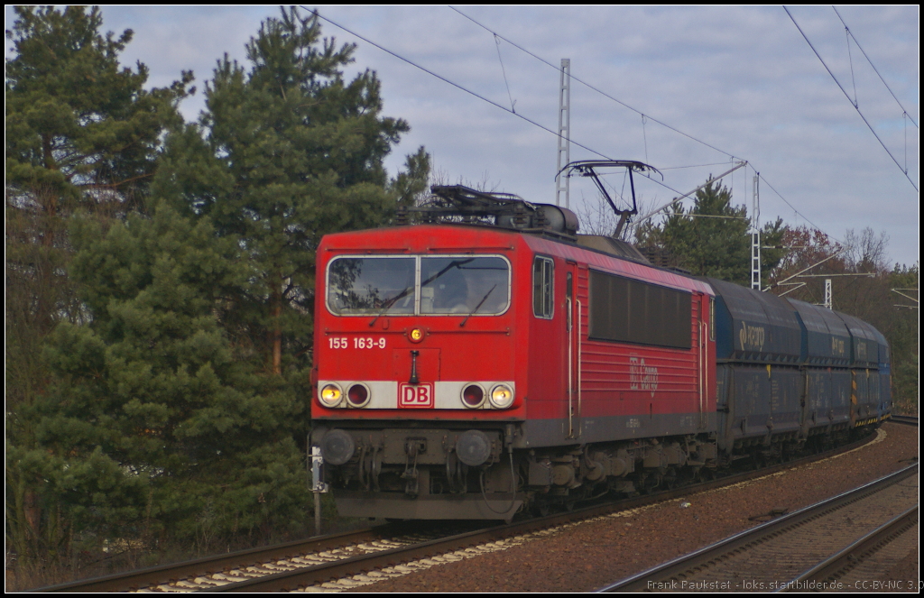 DB Schenker 155 163-9 am 06.02.2014 mit Falns-Wagen der PKP Cargo in der Berliner Wuhlheide
<br><br>
Update: 10.02.2015 in Opladen verschrottet