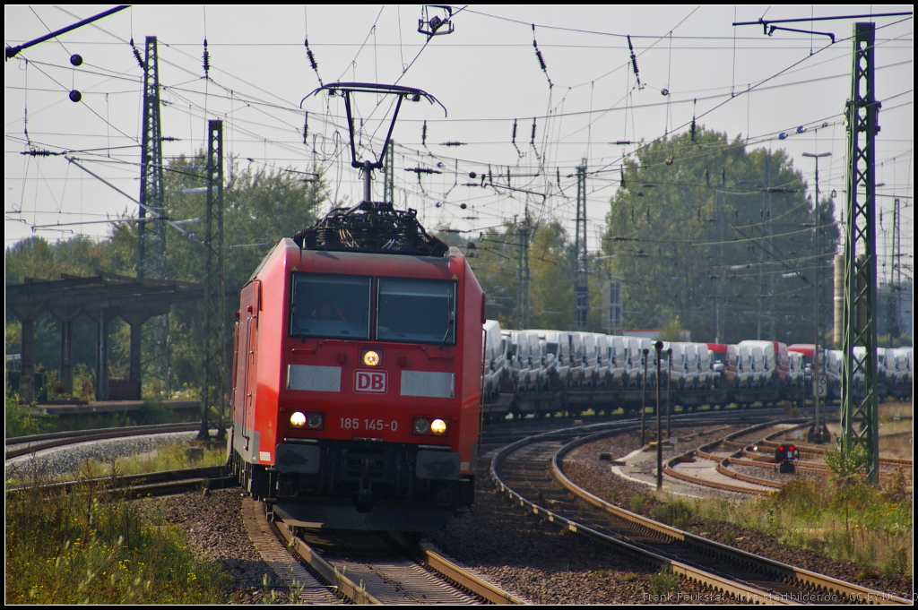 DB Schenker 185 145-0 mit neuen Autos am 05.09.2014 durch Uelzen