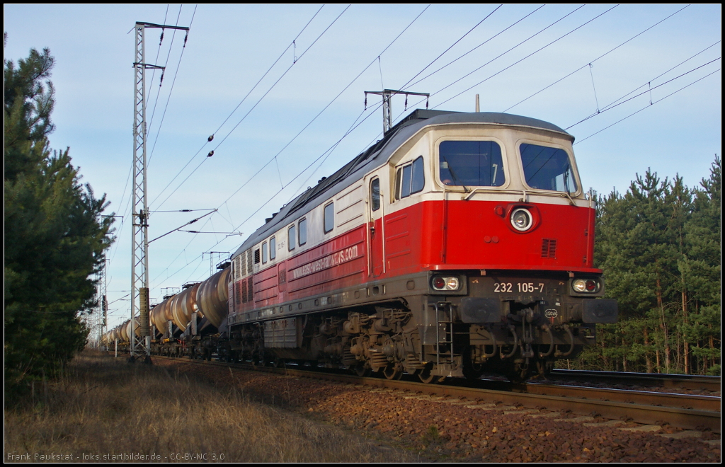 DB Schenker 232 105 am 10.02.2014 mit Zans-Wagen in der Berliner Wuhlheide