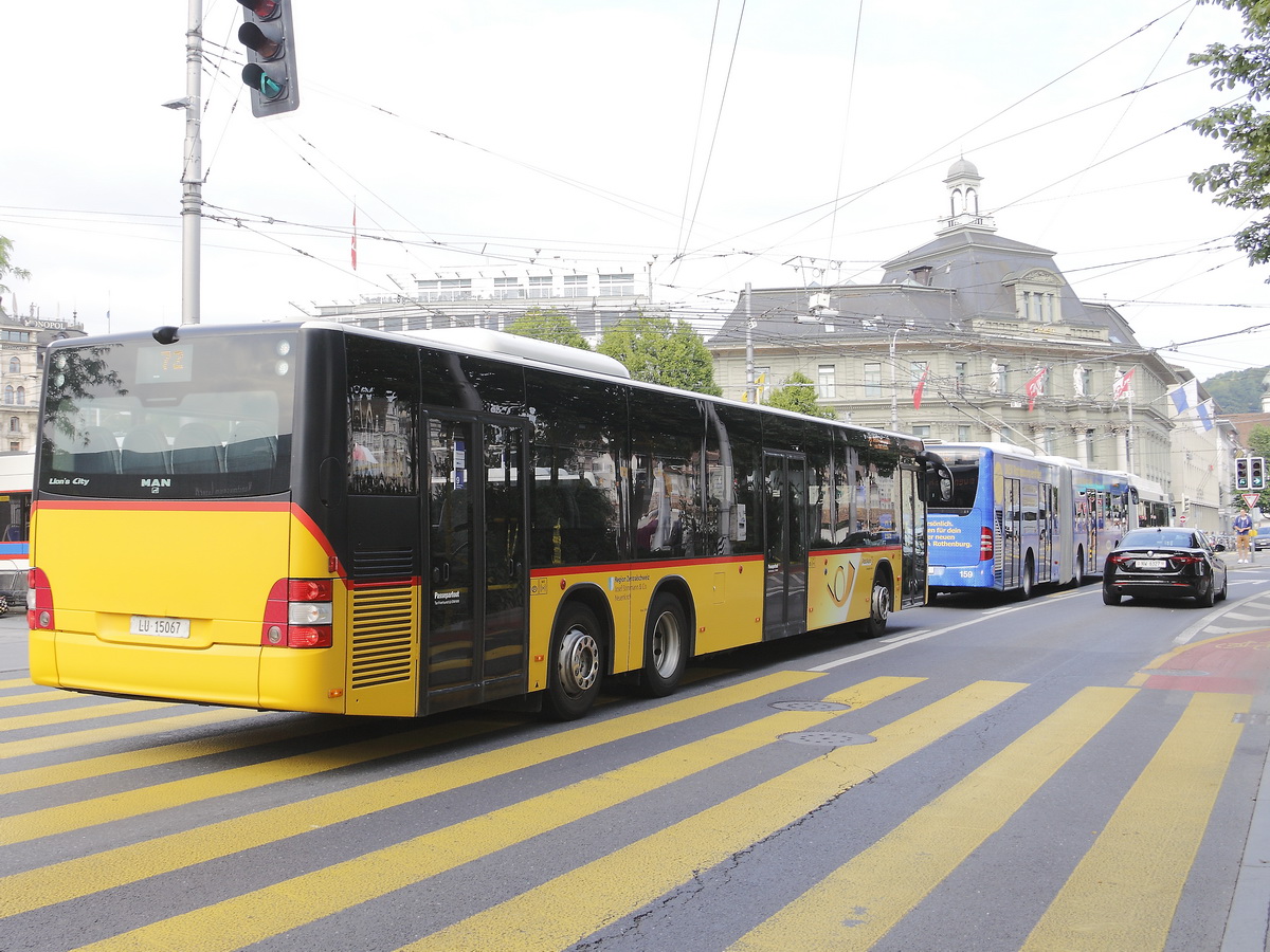 Heckansicht von Postauto - MAN Lion`s City LU 15067 unterwegs in der Stadt Luzern am 25. Juni 2018 am Bahnhof von Luzern. 