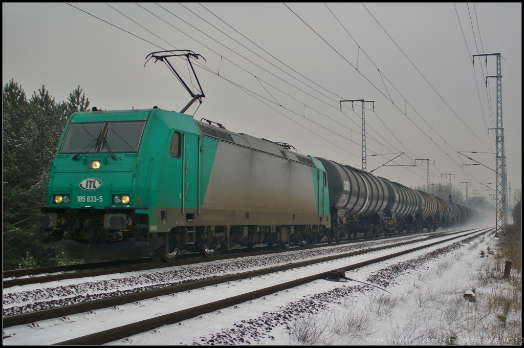 ITL 185 633 mit GATX-Zug am 28.01.2014 in der Berliner Wuhlheide (NVR-Nummer: 91 80 6185 633-5 D-RBSAF)