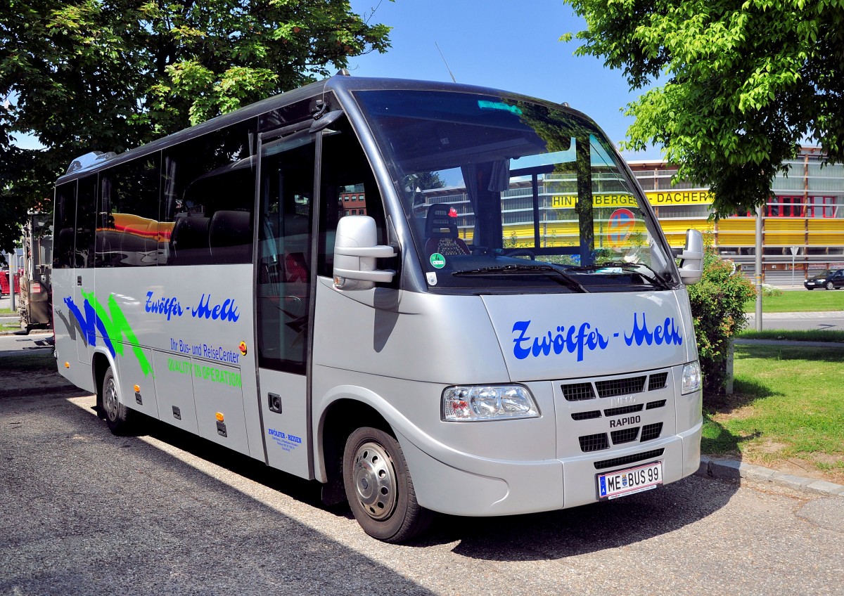 Kleinbus IVECO RAPIDO von ZWLFER Reisen aus sterreich am 29.5.2013 in Krems an der Donau.