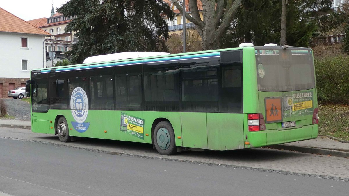 MAN Lion`s City von RhnEnergie steht am Bahnhof in Hnfeld, 12-2018