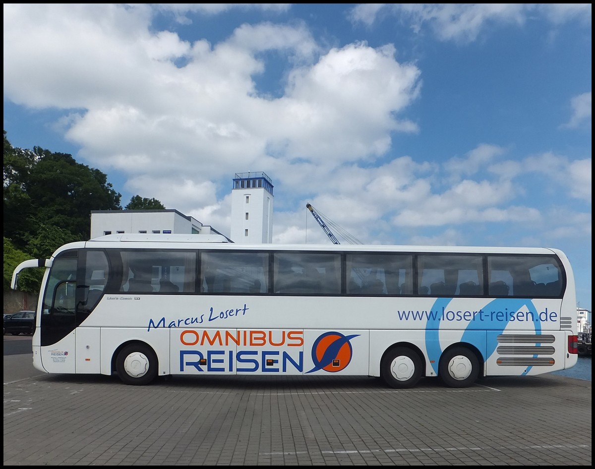 MAN Lion's Coach von Losert-Reisen aus Deutschland im Stadthafen Sassnitz. 