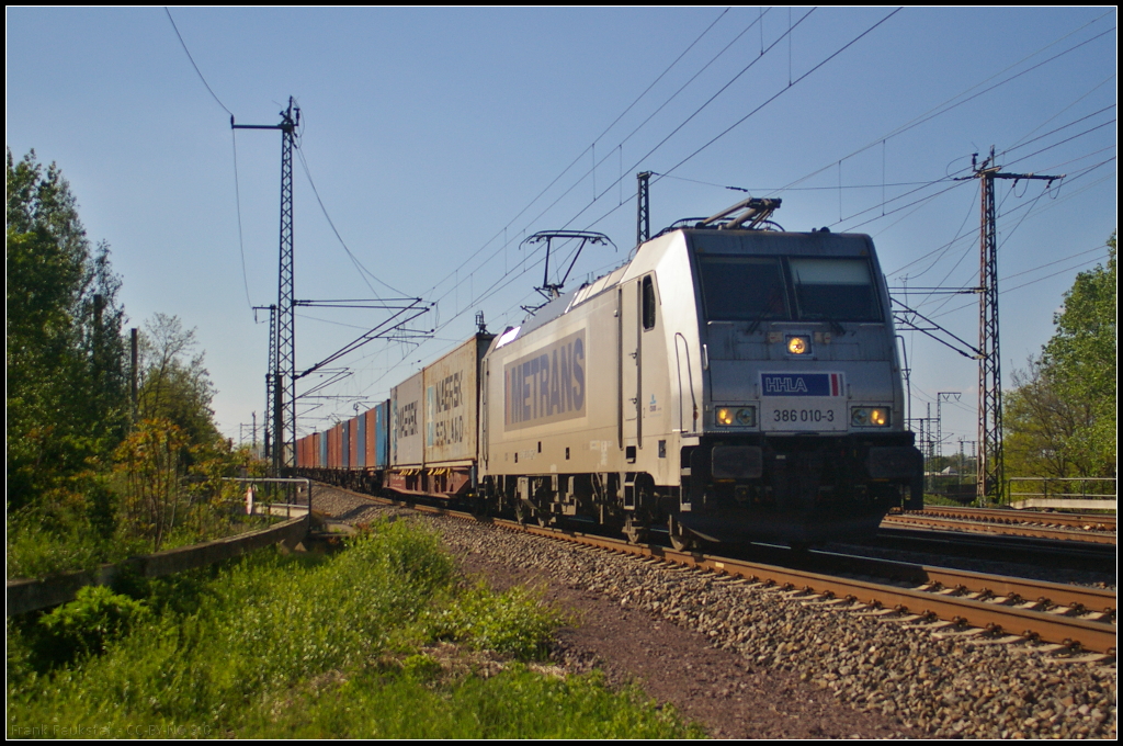 METRANS 386 010-3 mit Container in Magdeburg Neustadt, 10.05.2015
<br><br>
NVR-Nummer 91 54 7386 010-3 CZ-MT, Zulassung in D/A/CZ/SK/H/PL