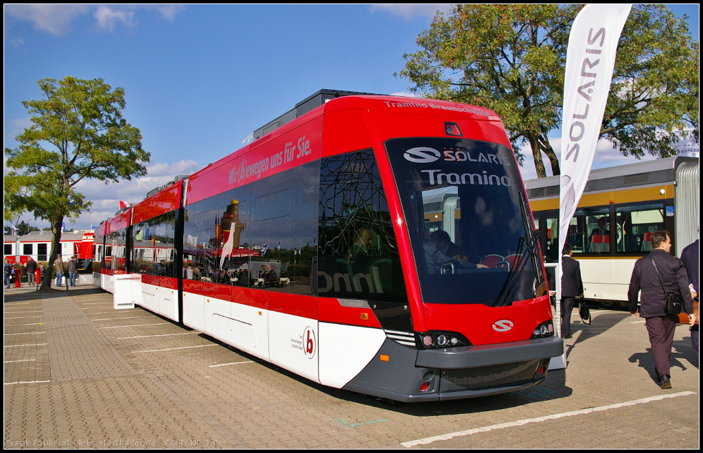 Solaris Tramino for Braunschweig, Germany.

Die erste Tram für die Braunschweiger Verkehrs-GmbH wurde 2014 geliefert. Bei der Tram handelt es sich um eine Niederflur-Straßenbahn mit durchgehenden Niederfluranteil. Jeder der vier Wagenkästen besitzt ein eigenes Fahrgestell, so die Lastverteilung auf alle Fahrwerke gegeben ist. Angetrieben wird die Tram mit 5 Motoren zu je 90 kW.

Daten: Länge 36 m, Breite 2.30 m, Sitzplätze 90, Stehplätze 121, Doppeltüren 6.

Webseite Wiki (deutsch): http://de.wikipedia.org/wiki/Solaris_Tramino
Webseite Betreiber (deutsch): http://www.verkehr-bs.de/unternehmen/solaris-tramino-braunschweig/der-tramino.html
