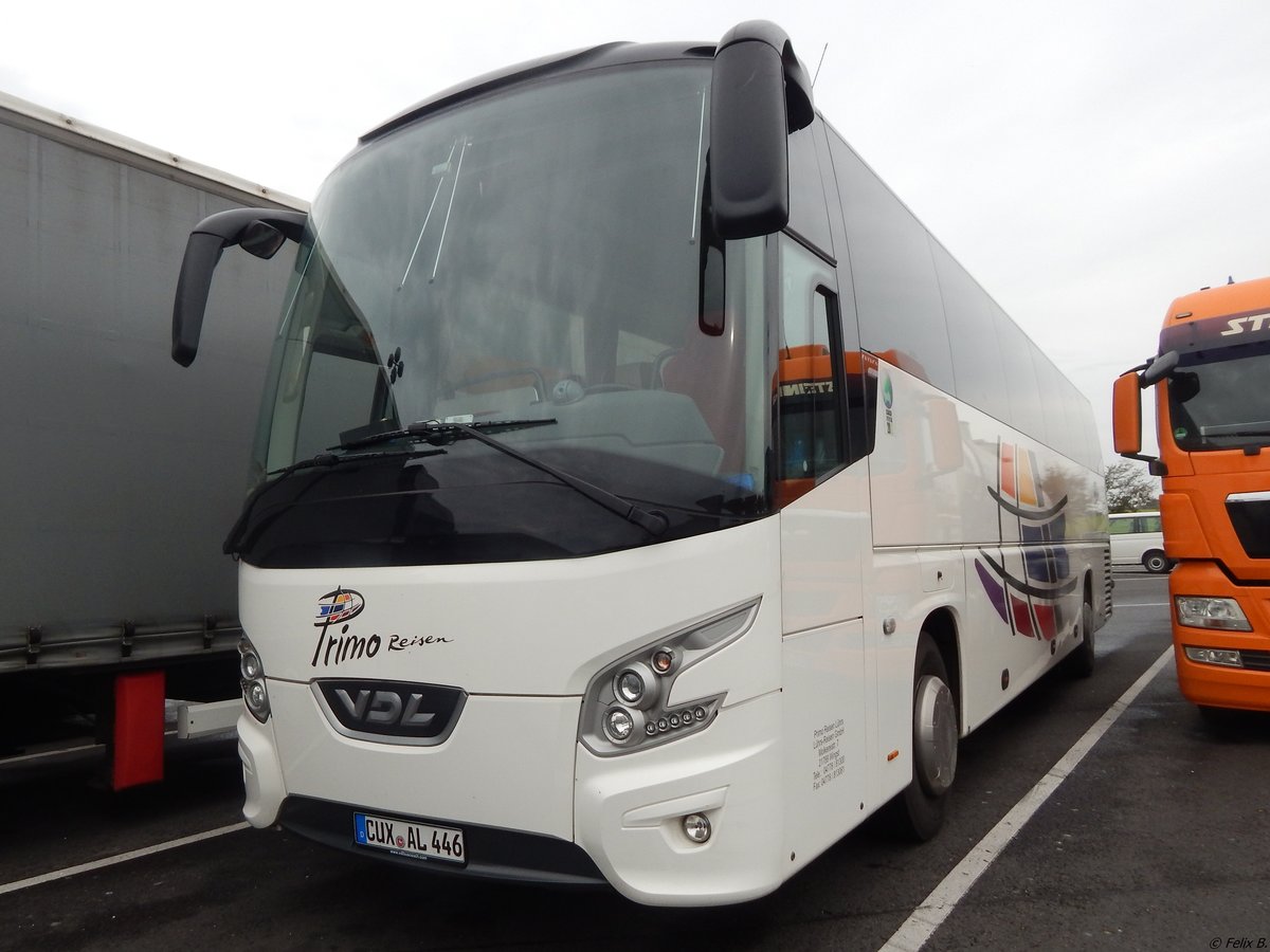 VDL Futura von Primo Reisen aus Deutschland auf einem Autobahnparkplatz.