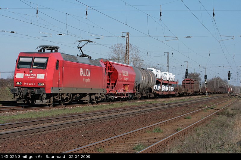 DB Schenker 145 025-3 mit gemischtem Gterzug Richtung Seddin (gesichtet Nuthetal-Saarmund 02.04.2009).