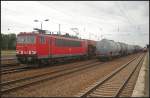 DB Schenker 155 123-3 kommt mit Sch�ttgutwagen und f�hrt Richtung Gr�nauer Kreuz (gesehen Berlin Sch�nefeld Flughafen 17.07.2011)