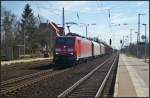 DB Schenker 189 060 mit einem gemischtem G�terzug am 15.04.2013 in Wustermark-Priort