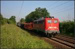 DB Schenker 140 677-6 mit gemischtem G�terzug Richtung Lehrte (gesehen Lehrte-Ahlten b.