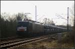 PKP Cargo ES 64 F4-803 / 189 803 mit neuen Autos im Gegenlicht (gesehen Berlin Wuhlheide 22.03.2012)