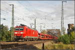 DB Cargo 185 149-2 fuhr mit leeren Autotransportwagen am 09.09.2017 am Abzweig Magdeburg Elbbrücke vorbei