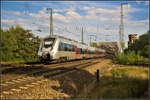 DB Regio 1442 303-2 fuhr als RE13 Magdeburg Hbf am 08.09.2018 gerade von der Elbbrücke in Magdeburg herunter