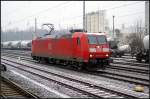 Solo ist am 30.01.2011 DB Schenker 185 070-0 auf Hhe des S-Bahnhofs Berlin Greifswalder Str unterwegs.