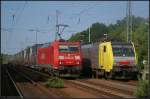 DB Schenker 185 186-4 mit dem  Ford-Zug  (gesehen Berlin Wannsee 01.06.2011)