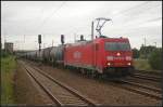 Mit einem Kesselwagenzug kommt am 17.07.2011 DB Schenker 185 214-4 zum Tf-Wechsel in Berlin Schönefeld Flughafen