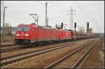 DB Schenker 185 348 mit einer Schwesterlok und einem Erzzug am 03.04.2013 in Berlin Schnefeld Flughafen