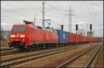 DB Schenker 152 072 mit einem Container-Zug am 14.04.2013 in Berlin Schnefeld Flughafen