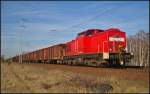 DB Schenker 298 312-0 mit Eas-x-Wagen am 20.03.2014 durch die Berliner Wuhlheide