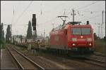 DB Schenker 185 179-9 mit leeren Wechselpritschen (gesehen Magdeburg Eichenweiler 09.08.2010)