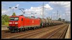 DB Schenker 185 006-4 mit Kesselwagen (gesehen Berlin Schönefeld Flughafen 22.08.2010)