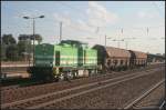 Mit einem Kurzzug ist die Werklok 20  Lisa 1  (293 024-6) der Erfurter Bahn nach Berlin unterwegs, hier bei der Durchfahrt Berlin Schönefeld Flughafen am 10.07.2011