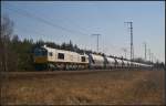 MEG 247 042-5 / 266 442 in Berlin Wuhlheide, 19.03.2015    Die Diesellok der Mitteldeutsche Eisenbahn GmbH, angemietet von DB Schenker, hatte Uacns-Wagen am Haken (CC 77000, 77042, NVR-Nummer 92 80