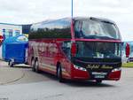 Neoplan Cityliner von Kofahl Reisen mit Anhänger aus Deutschland in Rostock.