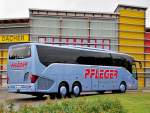 Setra 516 HD von Pfleger Reisen aus Niedersterreich am 17.Mai 2014 in Krems unterwegs.