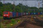 DB Schenker 189 022 mit Container am 16.07.2013 in Magdeburg