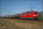 (Archiv) Die blitzblanke DB Schenker 151 008-0 war mit einem Kesselwagenzug am 22.03.2012 in der Berliner Wuhlheide unterwegs.