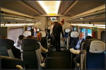 InnoTrans 2016 in Berlin: �berraschend ger�umiger Innenraum des Pesa Dart, PKP-Baureihe ED161 (2 150), der nicht nur im Mittelgang, sondern auch zwischen den Sitzreihen reichlich Platz bietet. An den Sitzpl�tzen sind Steckdosen f�r Laptops oder �hnliche Ger�te vorhanden.