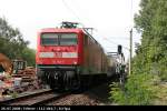 DB Regio 112 184-7 mit RE1 nach Eisenhüttenstadt am Bü hinter dem Bahnhof Erkner, 26.07.2008