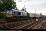 ERSR 6612 / 266 035 mit Containerzug (NVR-Nummer 92 80 1266 035-5 D-DISPO, Berlin Hirschgarten, 05.09.2008).