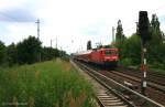 DB Regio 114 022-7 mit RE38447 nach Wünsdorf-Waldstadt in Berlin Karow, 15.06.2009