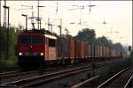 DB Schenker 155 163-9 mit Container erwischt gerade eine Wolkenlcke und die Sonne kommt zum Vorschein (Berlin Friedrichshagen, 01.07.2009)    Update: 10.02.2015 in Opladen verschrottet