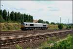 Deutsche Gleisbau Material Transport 6604, angemietet von CB Rail, fuhr solo am 31.07.2009 Richtung Karower Kreuz durch das Nordkreuz an der Bornholmer Straße in Berlin (NVR-Nummer 9280 1266