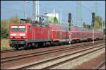 DB 143 259-4 fhrt mit einem Regional-Ersatzzug in den Bahnhof ein (Berlin Schnefeld, 26.09.2009)