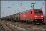 Railion 185 207-8 mit gemischtem Gterzug (TRAXX F140 AC2, DB Schenker Rail Deutschland AG, gesehen Wustermark-Priort 25.03.2010)