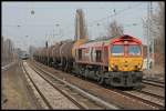 HGK DE 671 / 266 071-0 mit Kesselwagenzug (NVR-Nummer 92 80 1266 071-0 D-HGK, Typ JT42CWR, geleast ber HSBC Rail, gesehen Berlin Karow 30.03.2010)