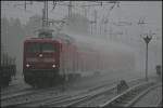 DB Regio 112 186-2 eilt mit dem RE1 durch den Gewitterregen (gesehen Berlin Hirschgarten 24.05.2010)