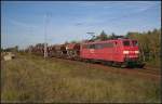 Die verkehrsrote DB Schenker 151 086-6 mit Schttgut unterwegs in Richtung Eichgestell (gesehen Berlin Wuhlheide 13.10.2010)