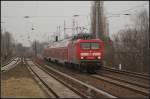 DB Regio 114 010-2 mit dem RE3 in Richtung Wünsdorf-Waldstadt mit nächstem Halt in Bln.-Gesundbrunnen auf Höhe Berlin-Karow (gesehen 13.03.2011)