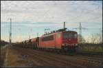 DB Schenker 155 148-0 und Schttgutwagen am 25.11.2011 in Nuthetal-Saarmund