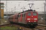 DB Schenker 151 160-9 und 151 119 mit ihrem Erzzug am 15.04.2012 in Berlin Schnefeld-Flughafen